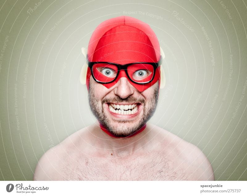 SUPERHERO Human being Masculine Young man Youth (Young adults) Man Adults 1 30 - 45 years Observe Smiling Red Hero Eyeglasses Person wearing glasses Freak Crazy