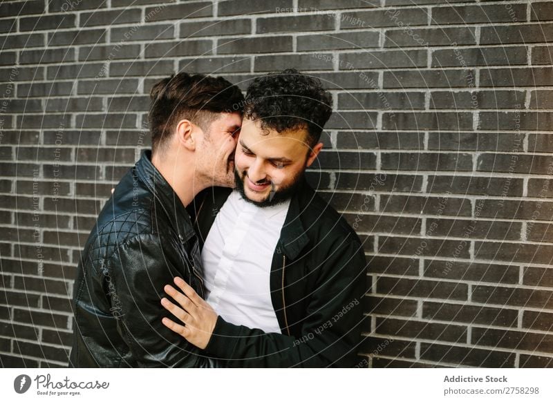 gay men kissing each other