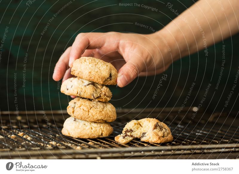 Hand putting cookies in roll Woman Cookie Home-made Roll Putt Close-up Food Dessert Sweet Snack Baked goods Bakery Human being Adults biscuit Baking Cooking