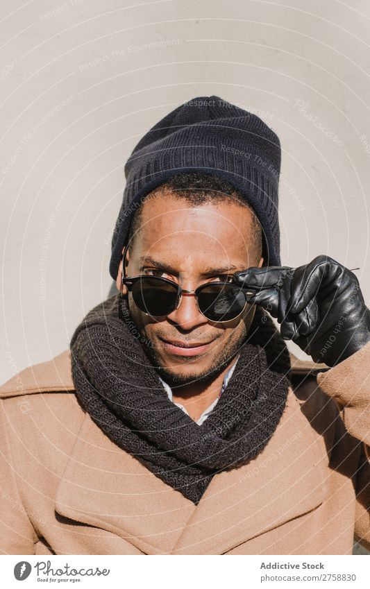 Black man in stylish sunglasses Man Adults Ethnic Sunglasses warm clothes Self-confident Cool (slang) Stand Human being handsome Lifestyle Modern Guy