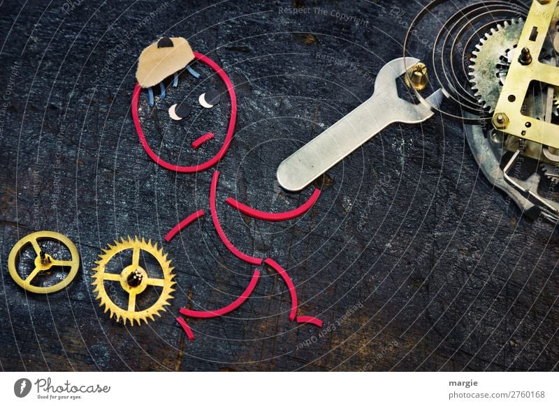 Rubber worms: Time change. A mechanic uses a wrench to turn a clockwork Tool Time machine Measuring instrument Clock Technology Advancement Future Human being
