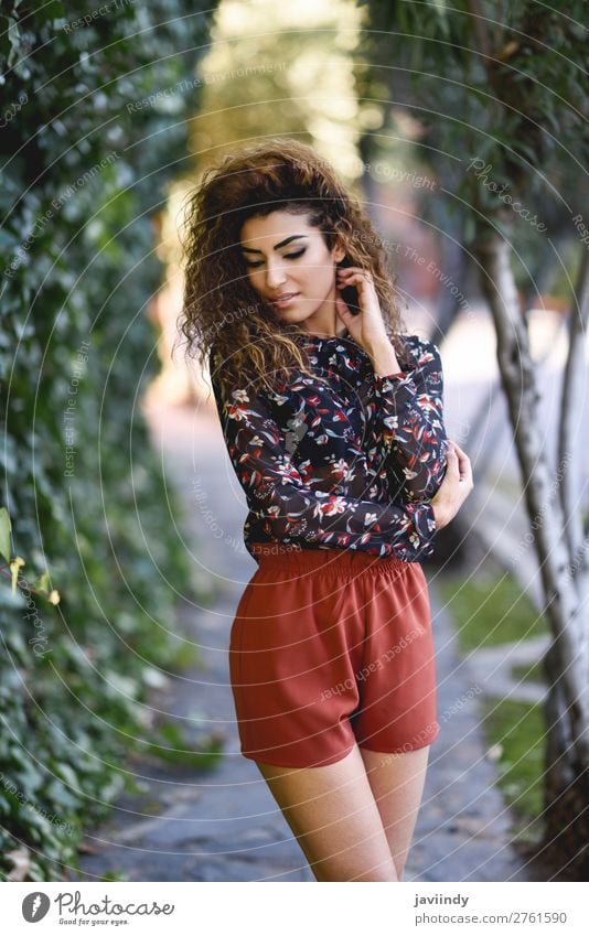 Beautiful young Arab woman with black curly hairstyle. Lifestyle Style Hair and hairstyles Human being Feminine Young woman Youth (Young adults) Woman Adults 1