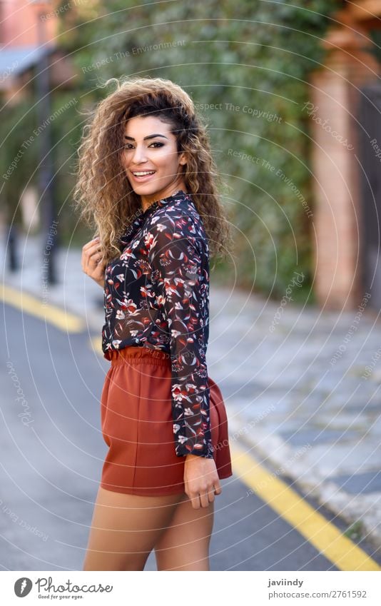 Happy young arabic woman with black curly hairstyle. Lifestyle Style Joy Beautiful Hair and hairstyles Human being Feminine Young woman Youth (Young adults)