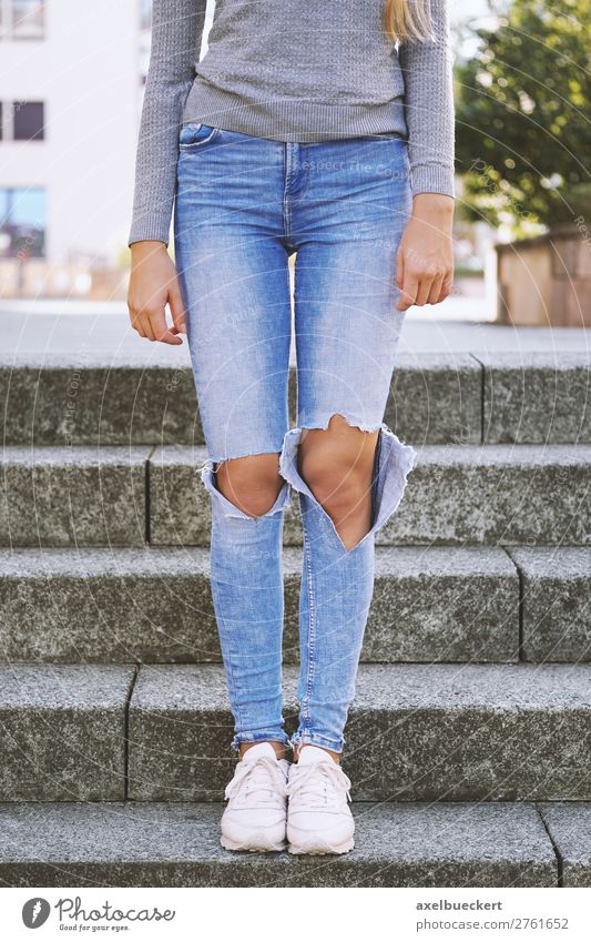 Ripped Jeans Fashion Trend - a Royalty Free Stock Photo from Photocase