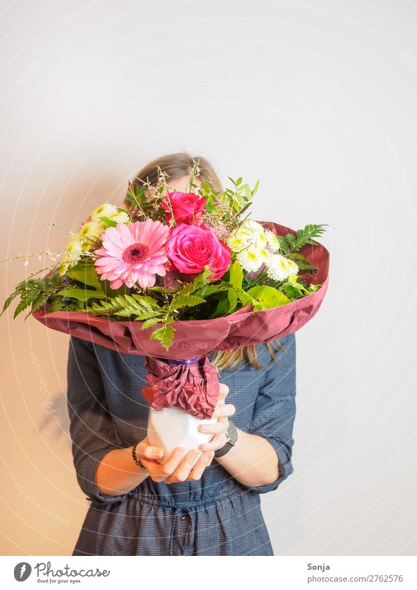 Young woman with a bouquet of flowers in front of her face Lifestyle Style Valentine's Day Mother's Day Birthday Youth (Young adults) Hand 1 Human being