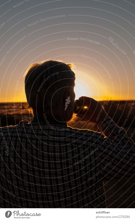 sundowners Human being Masculine Man Adults Male senior 1 45 - 60 years Looking Drinking Happy Yellow Joie de vivre (Vitality) Longing Desert Steppe Sunlight