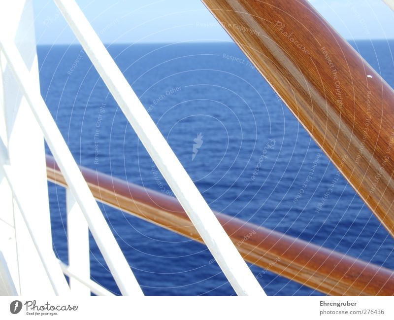 Wood, steel and sea Cruise Ocean Navigation Passenger ship Cruise liner Relaxation Blue Brown Wanderlust Colour photo Exterior shot Deserted Day Sunlight