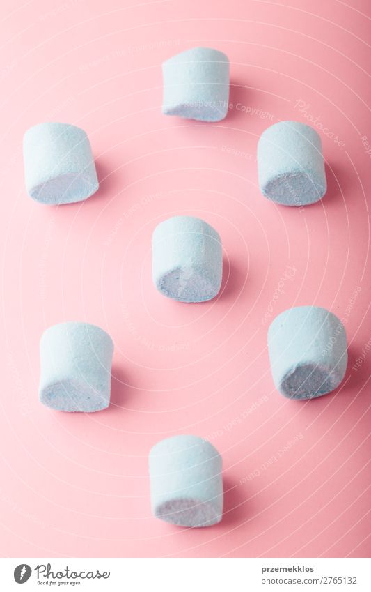 Blue Marshmallows On Plain Pink Background A Royalty Free Stock Photo From Photocase