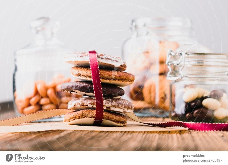 Gingerbread cookies, candies, sweets in jars on wooden table Dessert Nutrition Eating Diet Lifestyle Table To enjoy Delicious Brown Baking Bakery biscuit