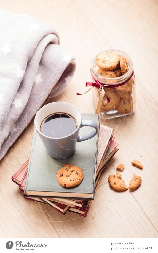A few books with cup of coffee and cookies on wooden floor Dessert Nutrition Eating Diet Coffee Mug Lifestyle Relaxation Leisure and hobbies Reading Table Book