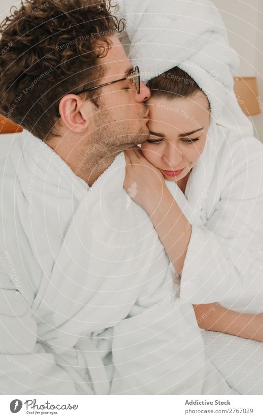 Couple With Towel In The Hotel Room Flirting Stock Photo