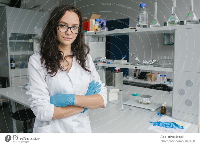 Woman in whites standing in lab Laboratory Work and employment Science & Research Human being arms crossed Looking into the camera Scientist Medication