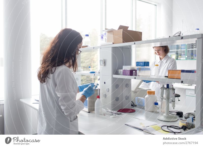 Women standing and working in lab Laboratory Work and employment Science & Research Woman Scientist Medication Chemistry Technology Doctor experiment scientific