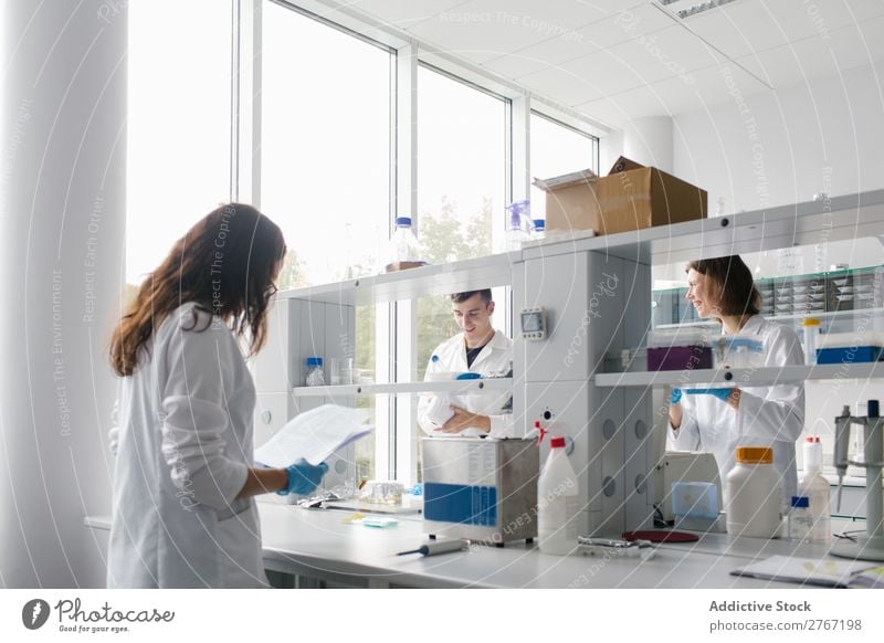 People co-working in lab Laboratory Work and employment Science & Research Woman Man Human being Scientist Medication Chemistry Technology Doctor experiment