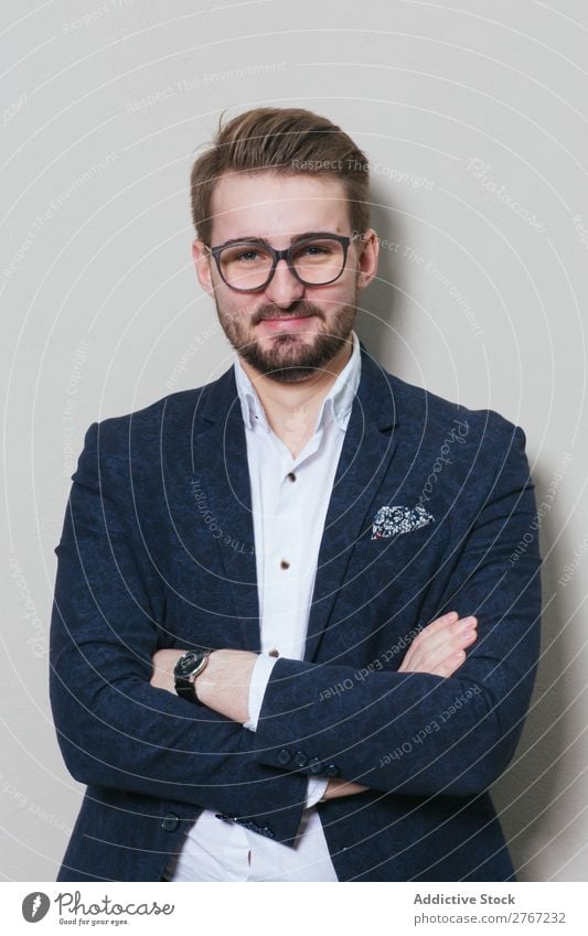 Young stylish man at white wall Man Suit Style handsome arms crossed Person wearing glasses Wall (building) Fashion Youth (Young adults) Portrait photograph