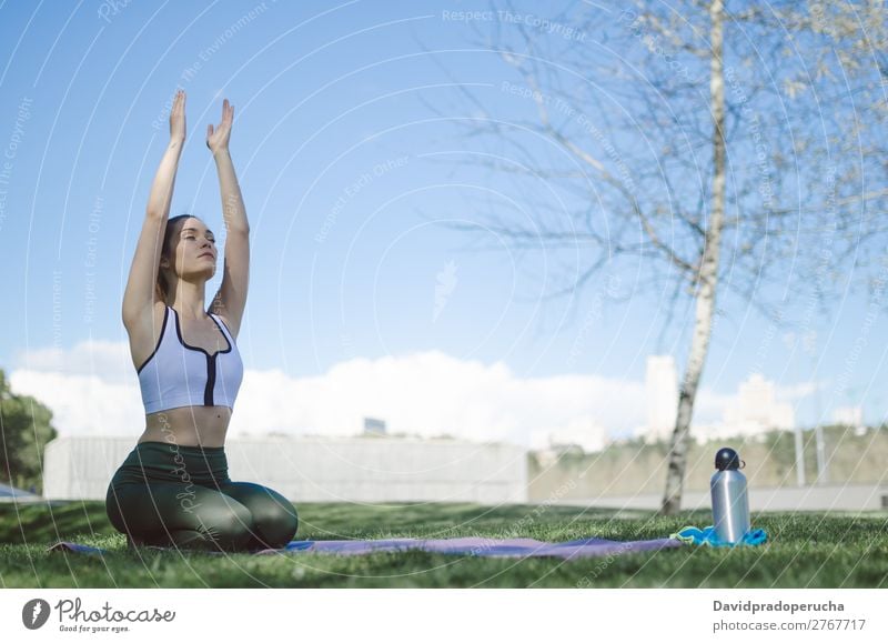 woman doing yoga and pilates outdoor with her mat Lifestyle Beautiful Body Relaxation Meditation Sports Yoga Human being Woman Adults Nature Warmth Park