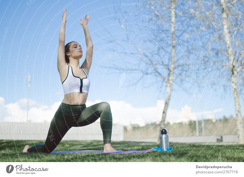 woman doing yoga and pilates outdoor with her mat Lifestyle Beautiful Body Relaxation Meditation Sports Yoga Human being Woman Adults Nature Warmth Park