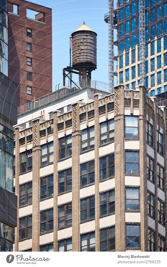 Water tank on a roof, New York, USA. Small Town Downtown House (Residential Structure) Building Architecture Wall (barrier) Wall (building) Facade Window Roof
