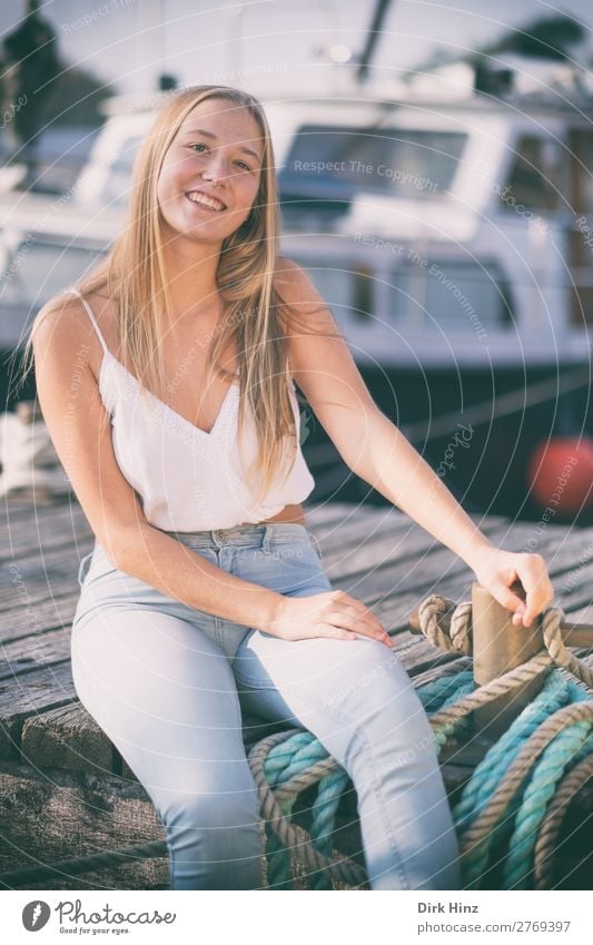 Young woman on a jetty Joy Summer Feminine Girl Youth (Young adults) Sister Family & Relations Friendship 1 Human being 18 - 30 years Adults Harbour Love Blonde