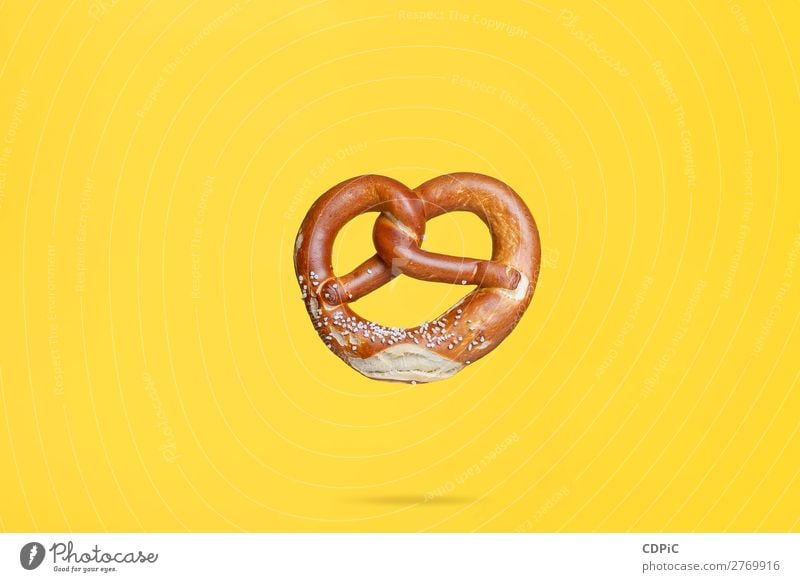 Flying Food Concept German Traditional Salted Pretzel Bread Fresh Delicious Soft bretzel market background food Salty eat Snack salt pretzels Baked goods german