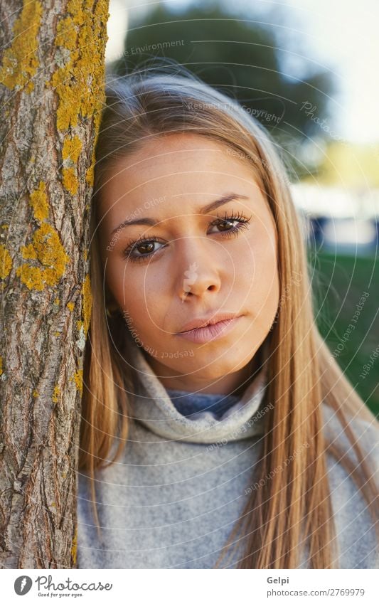 Pretty blonde girl in the park Lifestyle Joy Happy Beautiful Face Calm Leisure and hobbies Woman Adults Youth (Young adults) Environment Nature Autumn Weather