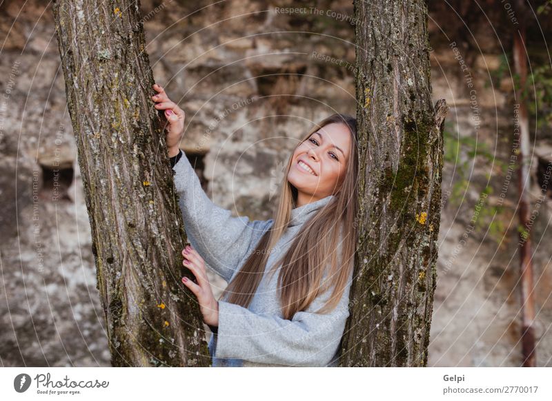 Beautiful woman next to the trunk of a tree Lifestyle Happy Face Freedom Summer Human being Woman Adults Nature Autumn Wind Tree Park Forest Fashion Blonde