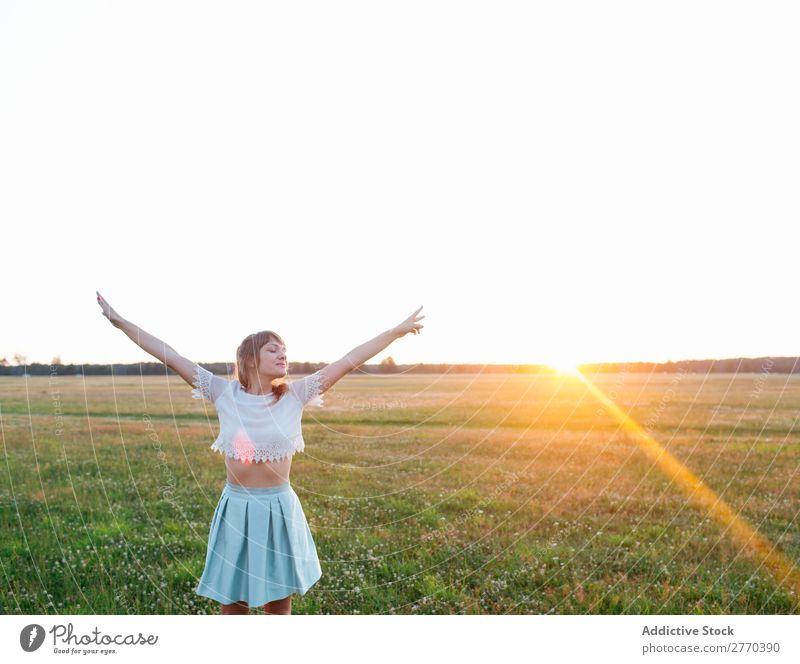 Woman posing in field Freedom Field Sunset romantic Posture Nature Dream Landscape Energy Style hands apart Relaxation To enjoy Harmonious Meditation