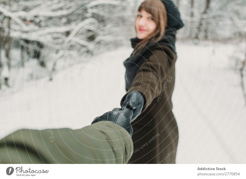 Woman gesturing follow me in winter forest Forest Winter Snow Cold Nature Youth (Young adults) Gesture Photographer holding hands White Beautiful Happy Seasons
