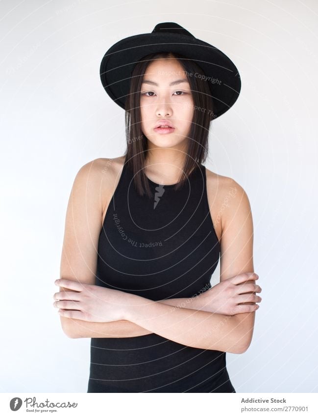 Young Asian woman with arms crossed Woman Style fashionable asian Hat Beautiful Fashion Beauty Photography Youth (Young adults) Model Portrait photograph