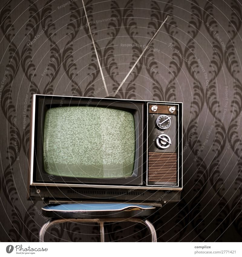 70s television set in front of vintage wallpaper Moving (to change residence) Interior design Wallpaper Room Living room Entertainment TV set Screen Technology