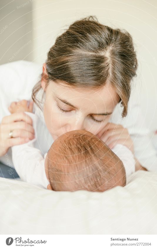 Portrait of a mother with her baby at home. Baby Mother Love Family & Relations Youth (Young adults) Beautiful motherhood Child Considerate Human being