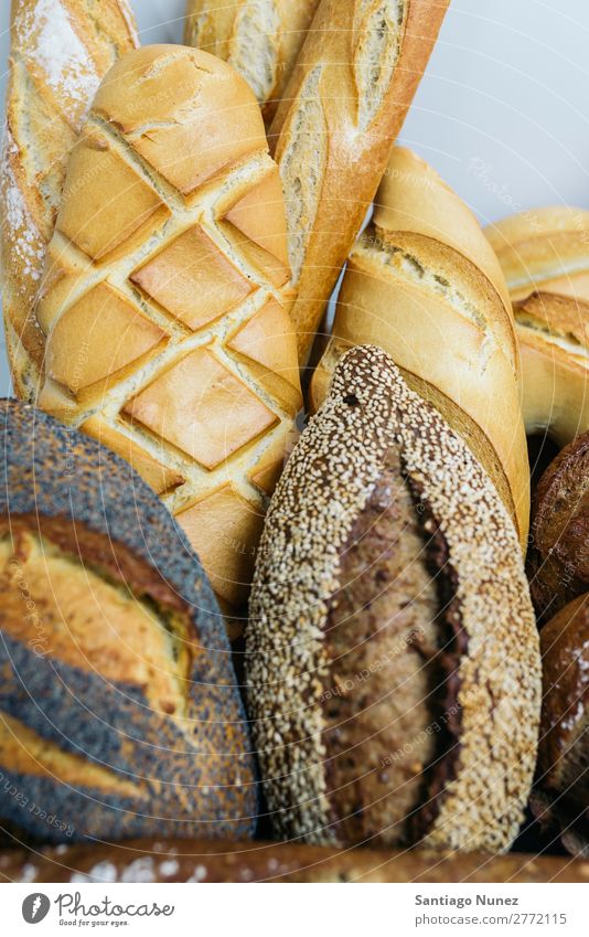 Many mixed breads and rolls. Bread Fresh Food White Bakery Background picture Breakfast Meal Grain Flour loaf Seed whole Wheat Baking Dough Baguette Healthy