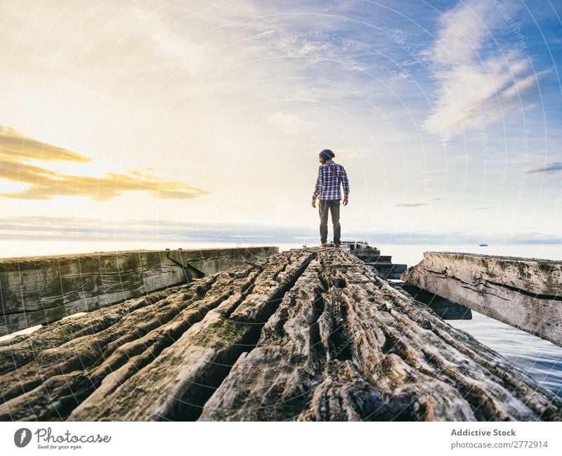 Traveler posing on ruined pier traveler Jetty Ruin abandoned Landscape Tourism Adventure remains Vacation & Travel Loneliness Vantage point Nature Ocean