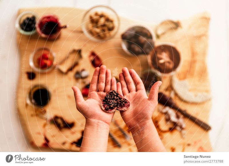 Close up of child hands preparing baking cookies. Girl Child Cookie Nutrition Hand Cooking hearth Kitchen Appetite Preparation Make Lunch Baby Dirty stained