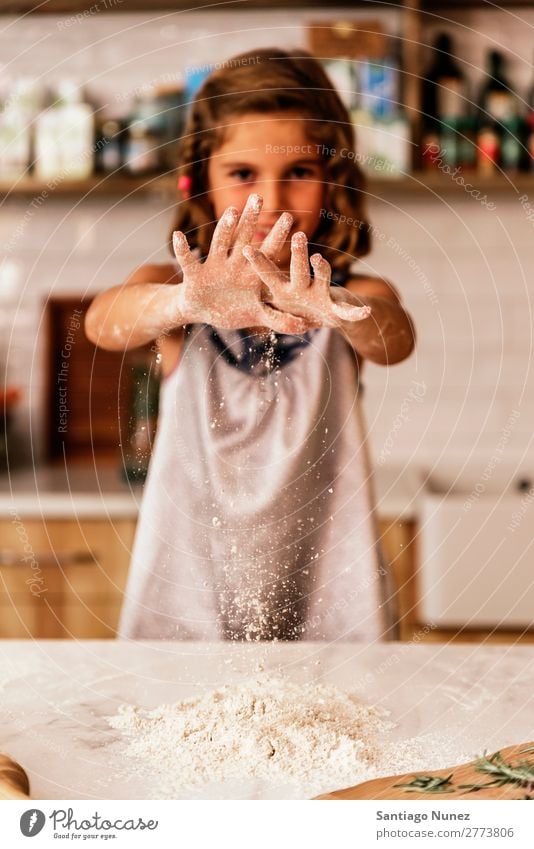 Little child girl kneading dough prepare for baking cookies. Child Girl Cook Cooking Kitchen Flour Chocolate Daughter Day Happy Joy Family & Relations Love