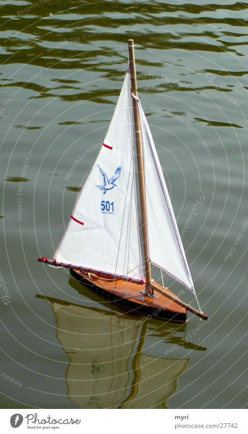 sailboat Lake Watercraft Sailboat Sailing Reflection Paris Park Leisure and hobbies Pattern Green water
