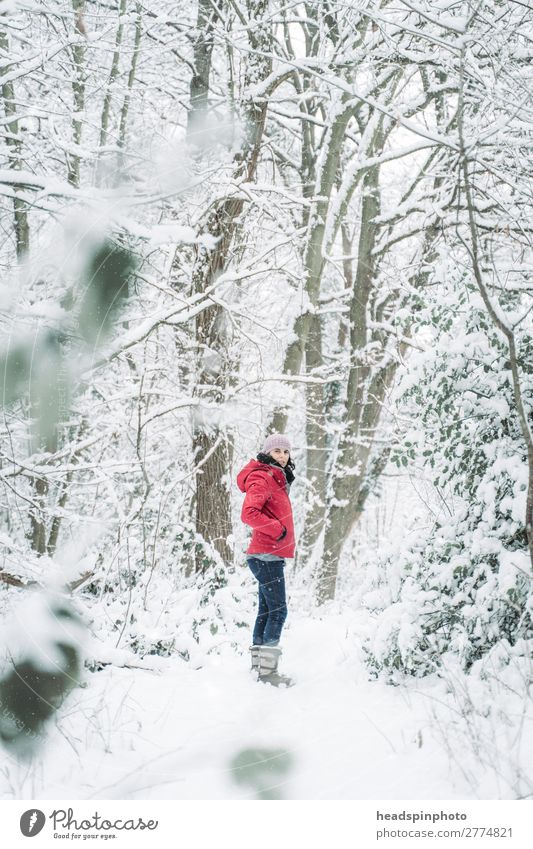 Woman with red jacket in the snow (forest) Joy Life Winter vacation Mountain Hiking Feminine Young woman Youth (Young adults) Adults 1 Human being Environment