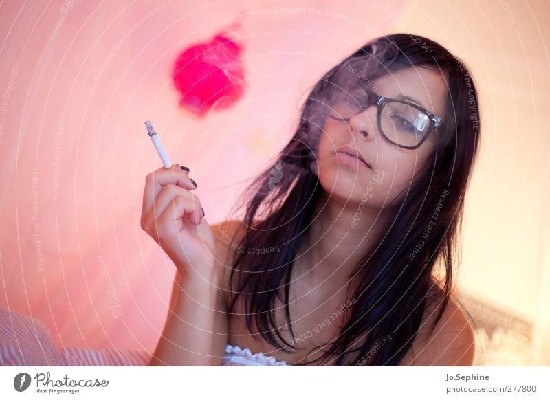 just blowin' smoke Lifestyle Style Smoking Intoxicant Bedroom Feminine Young woman Youth (Young adults) 1 Human being 18 - 30 years Adults Eyeglasses