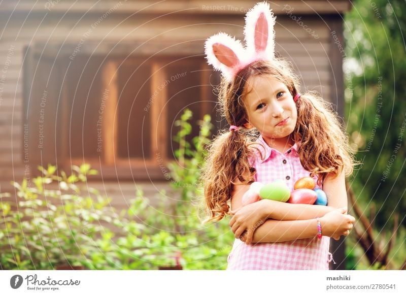 easter portrait of happy child girl in bunny ears Joy Happy Playing House (Residential Structure) Garden Feasts & Celebrations Easter Child Family & Relations