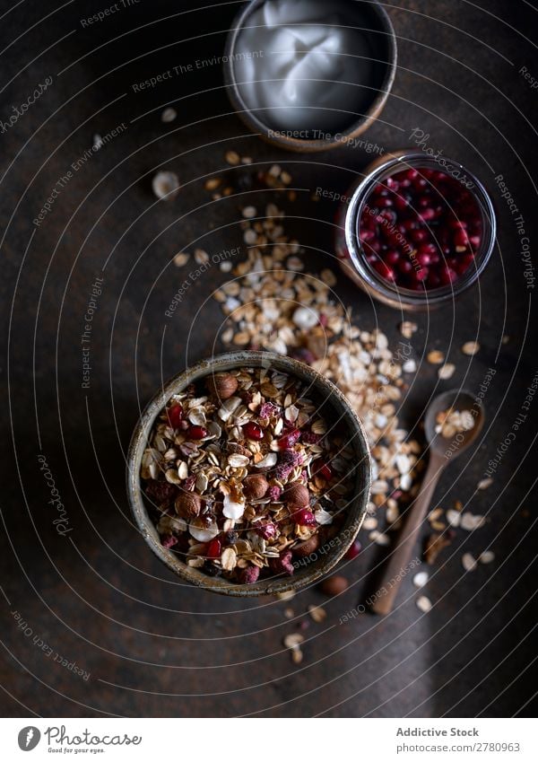 Rustic arrangement of granola for breakfast Cereal Breakfast Pomegranate Cream served Healthy oat Dessert Food Diet Snack Fresh Nutrition Natural Home-made Seed