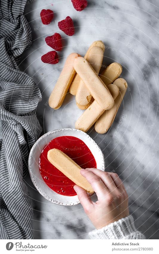 Crop person making raspberry biscuits Cooking Raspberry Jam dipping Sweet Red composition marmalade Fruit Cake Baking Healthy Fresh Cookie Natural Home-made