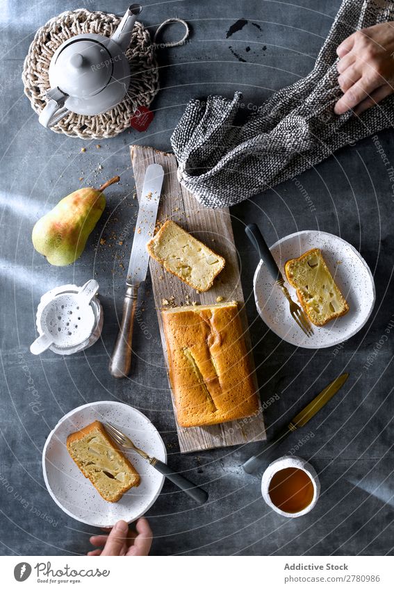 Flay lay of served freshly baked pear cake with tea on rustic table. Cake Teatime Set setting table Fresh Pear Eating Dessert Food Tradition Organic