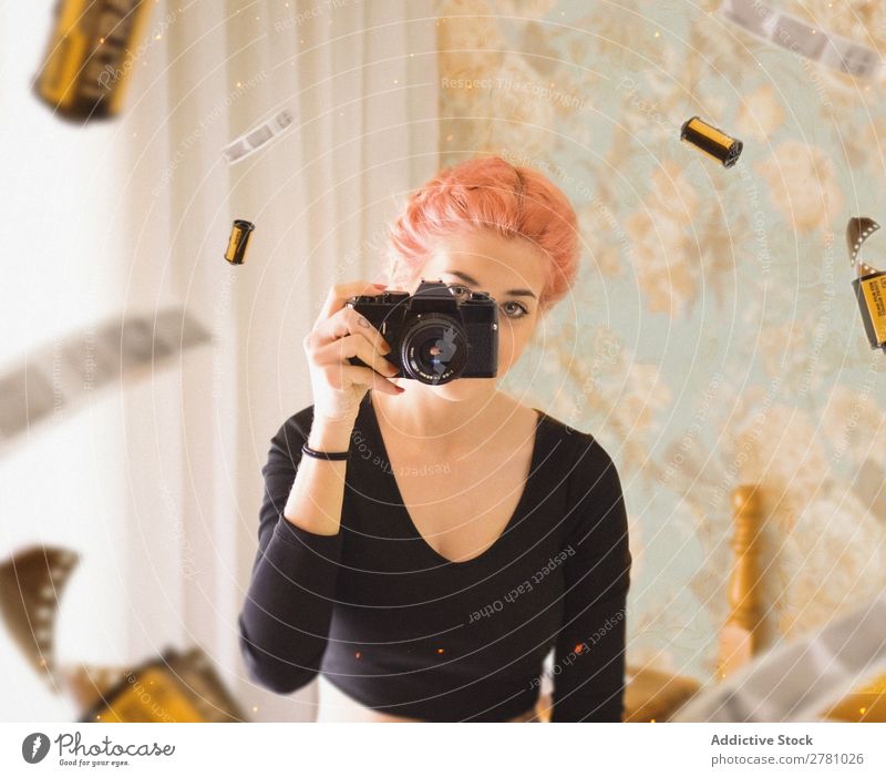 young girl with pink hair taking photo using film camera Camera Woman Photography Portrait photograph Film Looking into the camera Horizontal Abstract Flying