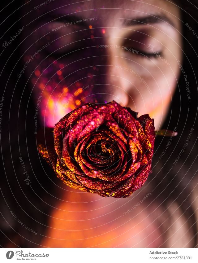 Young woman with glittering rose in mouth Woman Youth (Young adults) pretty eyes closed Rose Red Glittering Mouth Colour Painting (action, artwork) Fluorescent