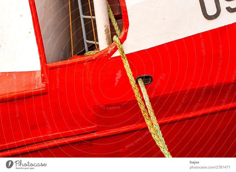 Mooring line to a red-white fishing boat Design Navigation Fishing boat Maritime Red mooring lines fishing cutter White Harbour moored hemp ropes Picturesque