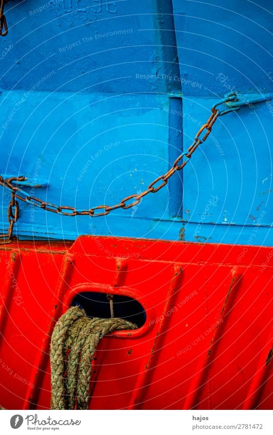 Mooring line to a red-blue fishing boat Design Navigation Fishing boat Maritime mooring lines fishing cutter Blue Red colourful Harbour anchored lashed Chain