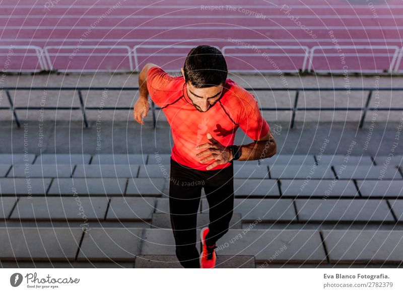 young athlete man running in the steps. Sports Lifestyle Leisure and hobbies Track and Field Masculine Young man Youth (Young adults) Man Adults 1 Human being