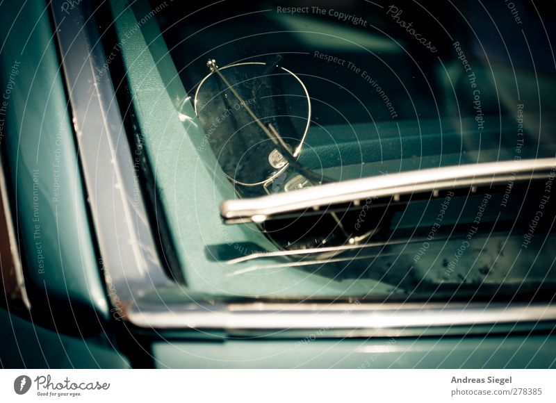 Worn out faces Vehicle Car Windscreen wiper Chrome Eyeglasses Authentic Exceptional Cool (slang) Retro Cliche Blue Beautiful Style Past Colour photo