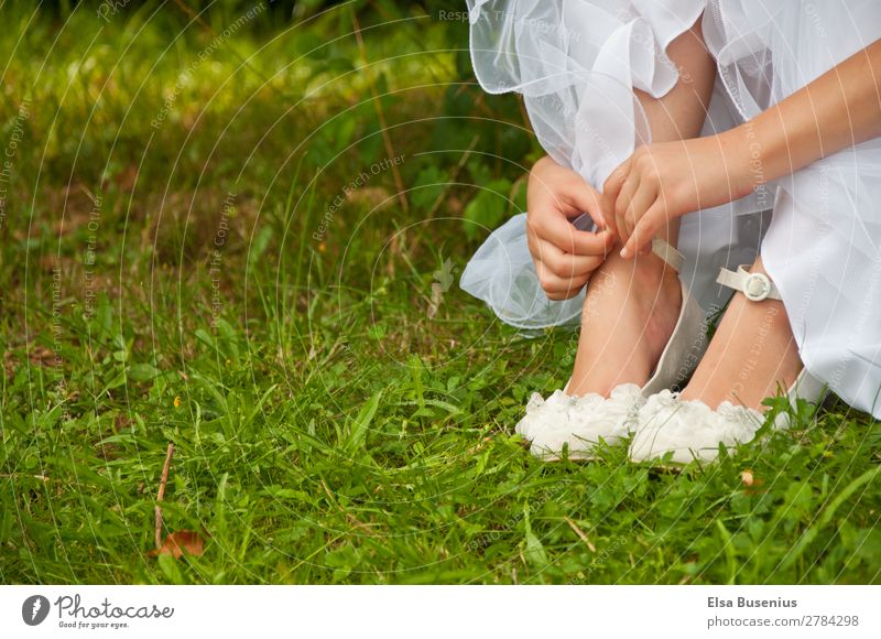 Girl in the grass Elegant Summer Human being Feminine Youth (Young adults) Hand Fingers Feet 1 8 - 13 years Child Infancy Dress Communion Footwear Touch Sit