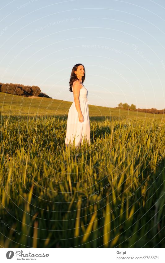 Woman looking at side relaxing on a meadow Lifestyle Joy Happy Beautiful Face Wellness Relaxation Vacation & Travel Summer Sun Human being Adults Nature Park